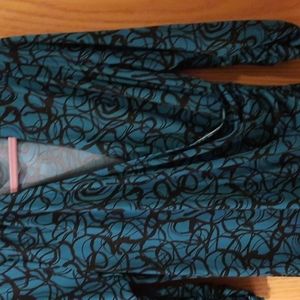 Susan Graver liquid Knit top.  Teal and black